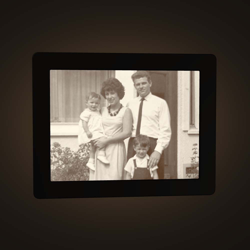 A 1960s family photo, lit
